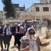 Foreign diplomats run as IDF troops fire warning shots as a group conducts a tour in the West Bank city of Jenin on May 21, 2025 (Screen grab via social media)