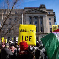 Demonstrators gather for a hearing on the detention of Palestinian activist and Columbia University graduate student Mahmoud Khalil outside the Federal Courthouse in Newark, New Jersey, March 28, 2025. (Eduardo Munoz/Reuters)