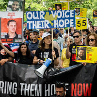 Protesters rally in support of the hostages in Central Park, New York City, June 8, 2025. (Luke Tress/ Times of Israel)