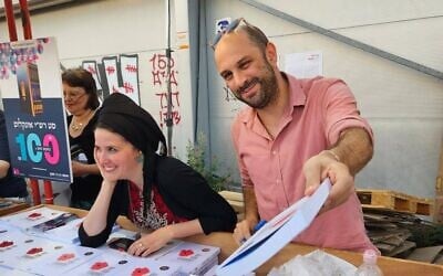 'One Day in October' authors Oriya Mevorach, left, and Yair Agmon, right, at Book Week in June 2024. (Courtesy)