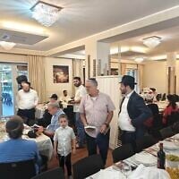 Stranded Israelis gather at the Chabad Piazza Bologna Center in Rome ahead of Shabbat after Israel closes its airspace following the tensions with Iran on Friday, June 13, 2025. (Courtesy)