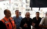 Prime Minister Benjamin Netanyahu tours the scene of a deadly Iranian missile strike in the city of Bat Yam on June 15, 2025. (Avi Ohayon/GPO)