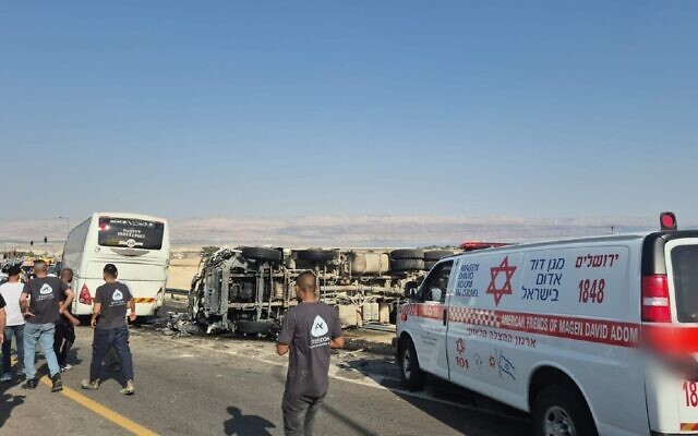 The scene of a traffic accident between a truck and a bus along Route 1 in the West Bank, east of Jerusalem and near the Dead Sea, on June 4, 2025. (Magen David Adom)