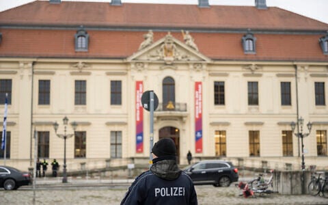 A police officer is pictured in front of the Jewish Museum Berlin building in Berlin, Germany, on February 8, 2024. (Stefanie Loos/AFP)