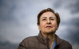 Iranian lawyer and 2003 Nobel Peace Prize winner Shirin Ebadi poses for a photograph during the presentation of the exhibition "Dessins pour la liberte" (Cartoons for peace), marking the international press freedom day on the shores of Lake Geneva, in Geneva on May 3, 2024. (Fabrice COFFRINI / AFP)