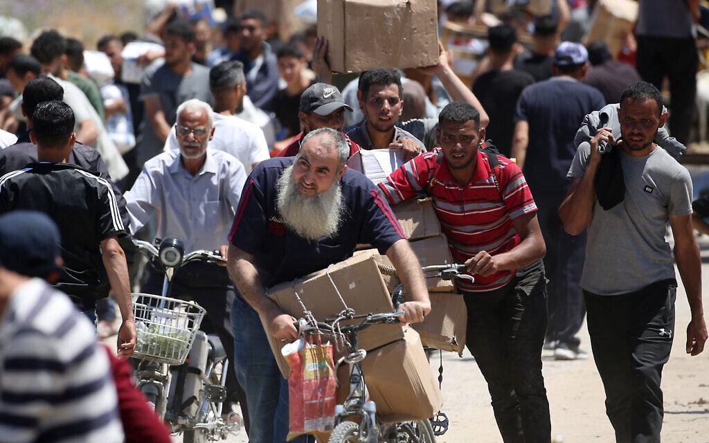 Gaza aid group says Hamas threats to staff kept distribution hubs closed on Saturday
