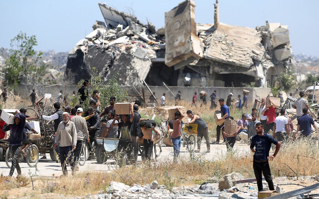 As Gazans clamor for aid, looting and shootings underscore new dangers