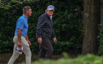 US President Donald Trump walks with golfer Bryson DeChambeau to the Oval Office at the White House on June 1, 2025 in Washington, DC. (Tasos Katopodis/Getty Images/AFP)