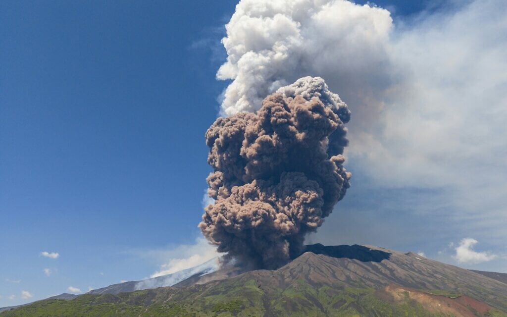 Smoke rises from the crater of the Etna volcano as it erupts, on Mount Etna near Catania on June 2, 2025. (Giuseppe Distefano / AFP)