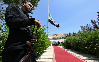 A large Syrian flag is raised on a pole at Tishreen Park in Damascus on June 4, 2025. (LOUAI BESHARA / AFP) A large Syrian flag is raised on a pole at Tishreen Park in Damascus on June 4, 2025. (LOUAI BESHARA / AFP)