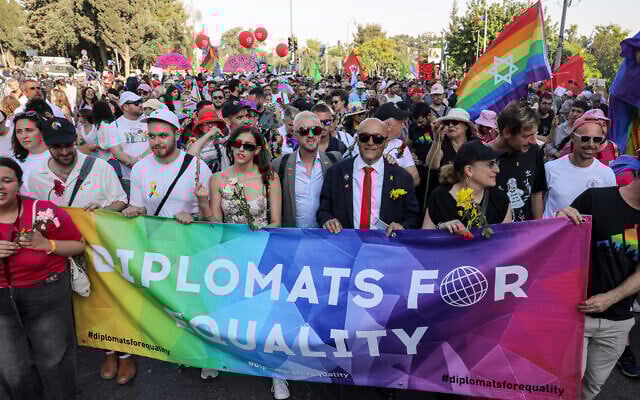 France's Ambassador to Israel Frederic Journes (3rd-R) attends the annual Jerusalem Pride Parade in the city center on June 5, 2025. (Photo by AHMAD GHARABLI / AFP)