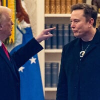 US President Donald Trump (left) and Elon Musk speak in the Oval Office before departing the White House in Washington, DC, on March 14, 2025. (ROBERTO SCHMIDT / AFP)