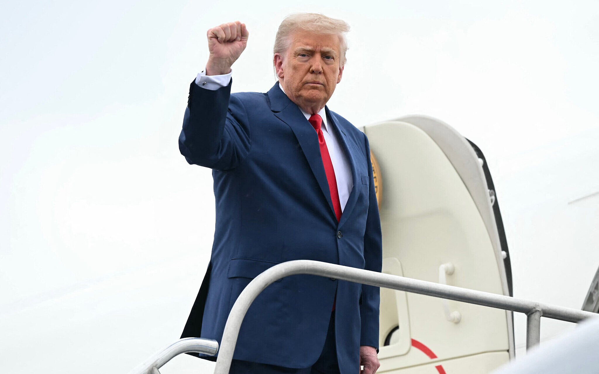 NextImg:Trump travel ban comes into effect, with citizens from 12 nations barred from US