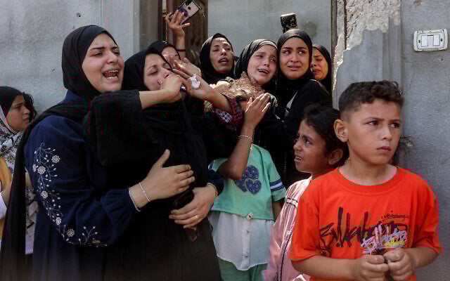 Women mourn during the funeral of a man killed in a strike in the Shati camp in the west of Gaza City on June 10, 2025. (Omar AL-QATTAA / AFP) Women mourn during the funeral of a man killed in a strike in the Shati camp in the west of Gaza City on June 10, 2025. (Omar AL-QATTAA / AFP)