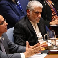 Ambassador Amir Saeid Iravani, Permanent Representative of Iran to the UN, listens as Ambassador Danny Danon, Permanent Representative of Israel to the UN, speaks during a UN Security Council meeting on threats to international peace and security at the United Nations Headquarters on June 13, 2025 in New York City. (Michael M. Santiago/Getty Images/AFP)