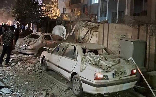 This handout photo released by Iran's Revolutionary Guard Corps (IRGC) official Sepah News Telegram channel on June 13, 2025, reportedly shows a building in Tehran hit in an Israeli strike on the Iranian capital early in the morning. Israeli Prime Minister Benjamin Netanyahu said in a video statement in the early hours of June 13 that Israel carried out strikes on Iran and the military operation against the Islamic Republic would  "continue for as many days as it takes." (Photo by SEPAH NEWS / AFP)