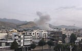 Handout photo released by Iran's Revolutionary Guard Corps' (IRGC) official Sepah News Telegram channel on June 13, 2025 shows smoke billowing from a site apparently targeted by an Israeli strike in the capital Tehran early in the morning. (Sepah News / AFP)