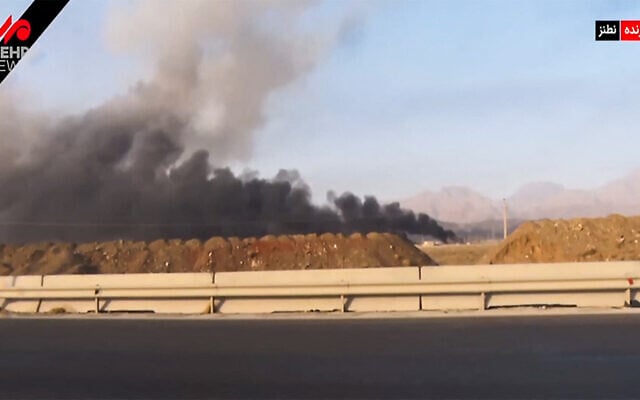 This image grab taken from footage broadcast by Iran's IRINN news on June 13, 2025 shows what the television described as smoke billowing from explosions in Natanz after Israel announced it had carried out strikes on Iranian nuclear and military sites (IRINN / AFP)