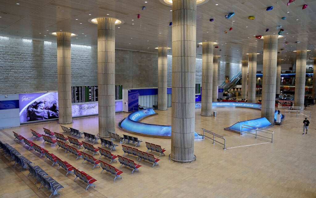 This picture shows the empty arrivals hall at Ben Gurion Airport near Tel Aviv on June 13, 2025 after Israel closed its air space in the wake of strikes on Iran. (Jack GUEZ / AFP)
