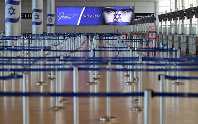 This picture shows the empty departure hall at Ben Gurion Airport near Tel Aviv on June 13, 2025 after Israel closed its airspace to takeoff and landing following strikes on Iran (Jack GUEZ / AFP)