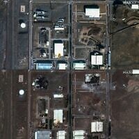 This combination of pictures created on June 14, 2025, shows a handout satellite image provided by Maxar Technologies and taken on June 14, 2025, of a closeup view the Natanz nuclear facilities near Ahmadabad in Iran, before an Israeli strike (top) and another closeup view taken on June 14, 2025, after an Israeli strike. (AFP Photo/ Satellite image ©2021 Maxar Technologies)