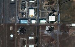 (COMBO) This combination of pictures created on June 14, 2025, shows a handout satellite image provided by Maxar Technologies and taken on June 14, 2025, of a closeup view the Natanz nuclear facilities (Shahid Ahmadi Roshan Nuclear Facilities) near Ahmadabad in Iran, before an Israeli strike (top) and another closeup view taken on June 14, 2025, after an Israeli strike. (AFP Photo/ Satellite image ©2021 Maxar Technologies)