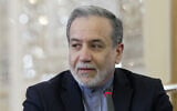 This handout picture provided by the Iranian foreign ministry shows Iran's Foreign Minister Abbas Araghchi meeting with ambassadors of foreign countries in Tehran on June 15, 2025. (Iran's Ministry of Foreign Affairs/AFP)