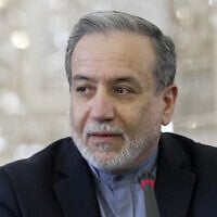 This handout picture provided by the Iranian foreign ministry shows Iran's Foreign Minister Abbas Araghchi meeting with ambassadors of foreign countries in Tehran on June 15, 2025. (Iran's Ministry of Foreign Affairs/AFP)