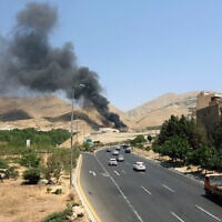 Illustrative: Smoke billows for the second day from the Shahran oil depot, northwest of Tehran, on June 16, 2025. (AFP)