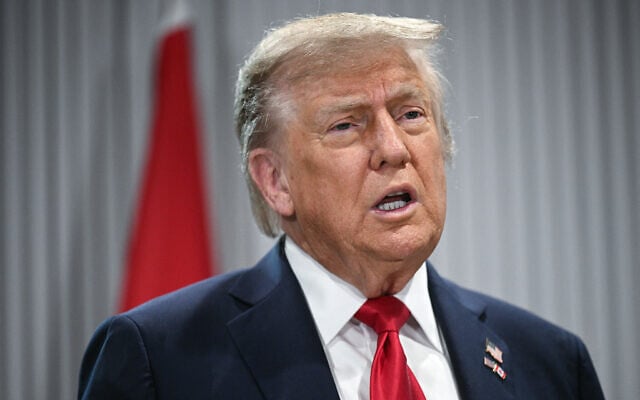 US President Donald Trump speaks to the press as he meets Canadian Prime Minister Mark Carney during the Group of Seven (G7) Summit at the Pomeroy Kananaskis Mountain Lodge in Kananaskis, Alberta, Canada on June 16, 2025. (Brendan SMIALOWSKI / AFP)