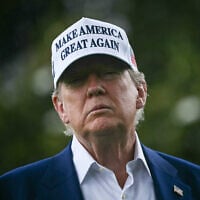 US President Donald Trump speaks to the press on the South Lawn of the White House in Washington, DC, on June 18, 2025. (Photo by Brendan SMIALOWSKI / AFP)