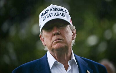 US President Donald Trump speaks to the press on the South Lawn of the White House in Washington, DC, on June 18, 2025. (Photo by Brendan SMIALOWSKI / AFP)