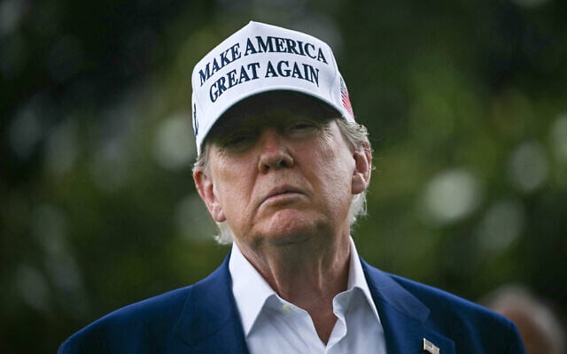 US President Donald Trump speaks to the press on the South Lawn of the White House in Washington, DC, on June 18, 2025. (Photo by Brendan SMIALOWSKI / AFP)