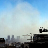 Smoke rises above buildings in Tehran following an Israeli strike on June 18, 2025, on the sixth day of fighting between Iran and Israel. (AFP)