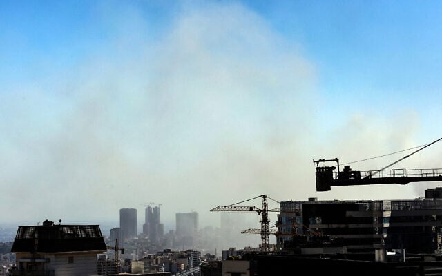 Smoke rises above buildings in Tehran following an Israeli strike on June 18, 2025, on the sixth day of fighting between Iran and Israel. (AFP)