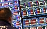 Traders work on the floor of the New York Stock Exchange (NYSE) at the in New York City on June 18, 2025 (TIMOTHY A. CLARY / AFP)