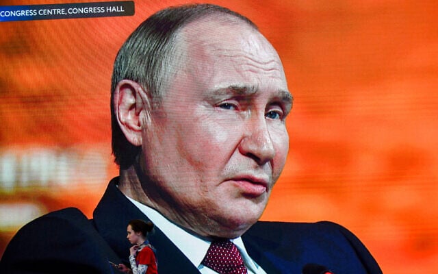 Russia's President Vladimir Putin is seen on huge TV screens inside ExpoForum Convention and Exhibition Centre as he attends the plenary session during the Saint Petersburg International Economic Forum (SPIEF) in Saint Petersburg, Russia, on June 20, 2025. (Olga MALTSEVA / AFP) Russia's President Vladimir Putin is seen on huge TV screens inside ExpoForum Convention and Exhibition Centre as he attends the plenary session during the Saint Petersburg International Economic Forum (SPIEF) in Saint Petersburg, Russia, on June 20, 2025. (Olga MALTSEVA / AFP)