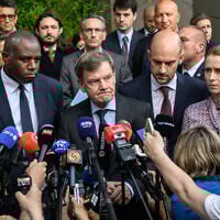 Germany's Foreign Minister Johann Wadephul (C), flanked by Britain's Foreign Secretary David Lammy (L), France's Minister for Europe and Foreign Affairs Jean-Noel Barrot (2nd R) and EU High Representative and Vice-President for Foreign Affairs and Security Policy Kaja Kallas (R), makes a statement following their meeting with Iran's Foreign Minister on Tehran's nuclear program, in Geneva, June 20, 2025. (Photo by Fabrice Coffrini / AFP)
