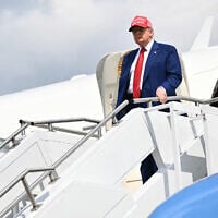 US President Donald Trump steps off Air Force One upon arriving at Morristown Municipal Airport in Morristown, New Jersey, on June 20, 2025. (Mandel Ngan/AFP)