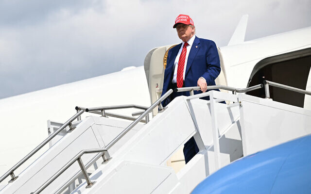 US President Donald Trump steps off Air Force One upon arriving at Morristown Municipal Airport in Morristown, New Jersey, on June 20, 2025. (Mandel Ngan/AFP)