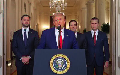 US President Donald Trump addresses the nation, alongside US Vice President JD Vance (L), US Secretary of State Marco Rubio (2nd R) and US Secretary of Defense Pete Hegseth (R), from the White House in Washington, DC on June 21, 2025, following the announcement that the US bombed nuclear sites in Iran. (Carlos Barria/AFP)