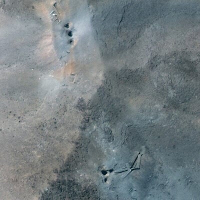 This handout satellite picture provided by Maxar Technologies and taken on June 22, 2025, shows Iran's Fordo Fuel Enrichment Plant (FFEP), northeast of the city of Qom, after US strikes on the site. (Satellite image ©2025 Maxar Technologies / AFP)