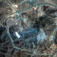 This handout satellite picture provided by Maxar Technologies, and taken on June 22, 2025, shows Iran's Fordo Fuel Enrichment Plant (FFEP), northeast of the city of Qom, after US strikes on the site. (Satellite image ©2025 Maxar Technologies / AFP)