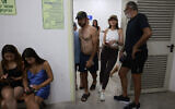 People gather in a underground shelter in Tel Aviv on June 23, 2025, after sirens sounded across the country as missiles were fired from Iran (Menahem Kahana / AFP)