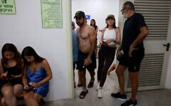 People gather in a underground shelter in Tel Aviv on June 23, 2025, after sirens sounded across the country as missiles were fired from Iran (Menahem Kahana / AFP)