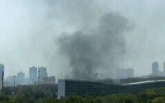 This grab taken from UGC images posted on social media on June 23, 2025, shows a plume of smoke billowing after Israeli strikes in Tehran. (UGC / AFP)