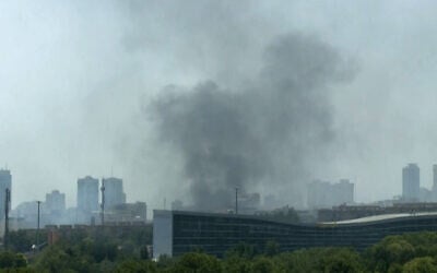 This grab taken from UGC images posted on social media on June 23, 2025, shows a plume of smoke billowing after Israeli strikes in Tehran. (UGC / AFP)