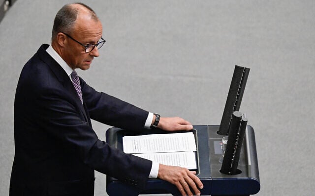 German Chancellor Friedrich Merz addresses delegates at the Bundestag (lower house of parliament) on June 24, 2025 in Berlin, prior on the upcoming NATO and EU summits. (John MACDOUGALL / AFP)