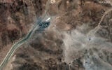 This handout satellite picture provided by Maxar Technologies and taken on June 24, 2025, shows new airstrike craters at a perimeter installation on Iran's Fordo nuclear facility, northeast of the city of Qom. (Satellite image ©2025 Maxar Technologies/AFP)