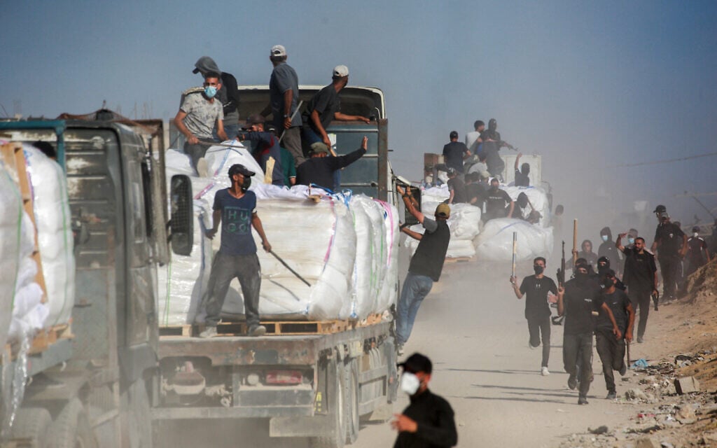 Gaza clans deny Hamas is stealing aid after Israel partially halts deliveries